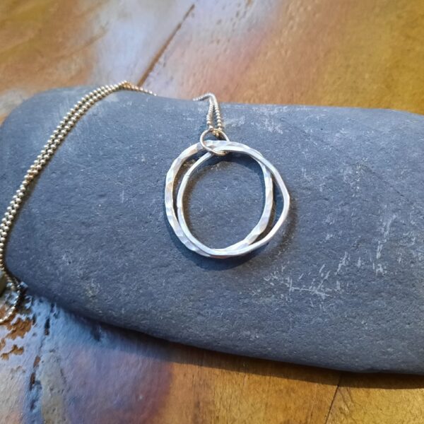 Ripples silver circle pendant with delicate ball chain